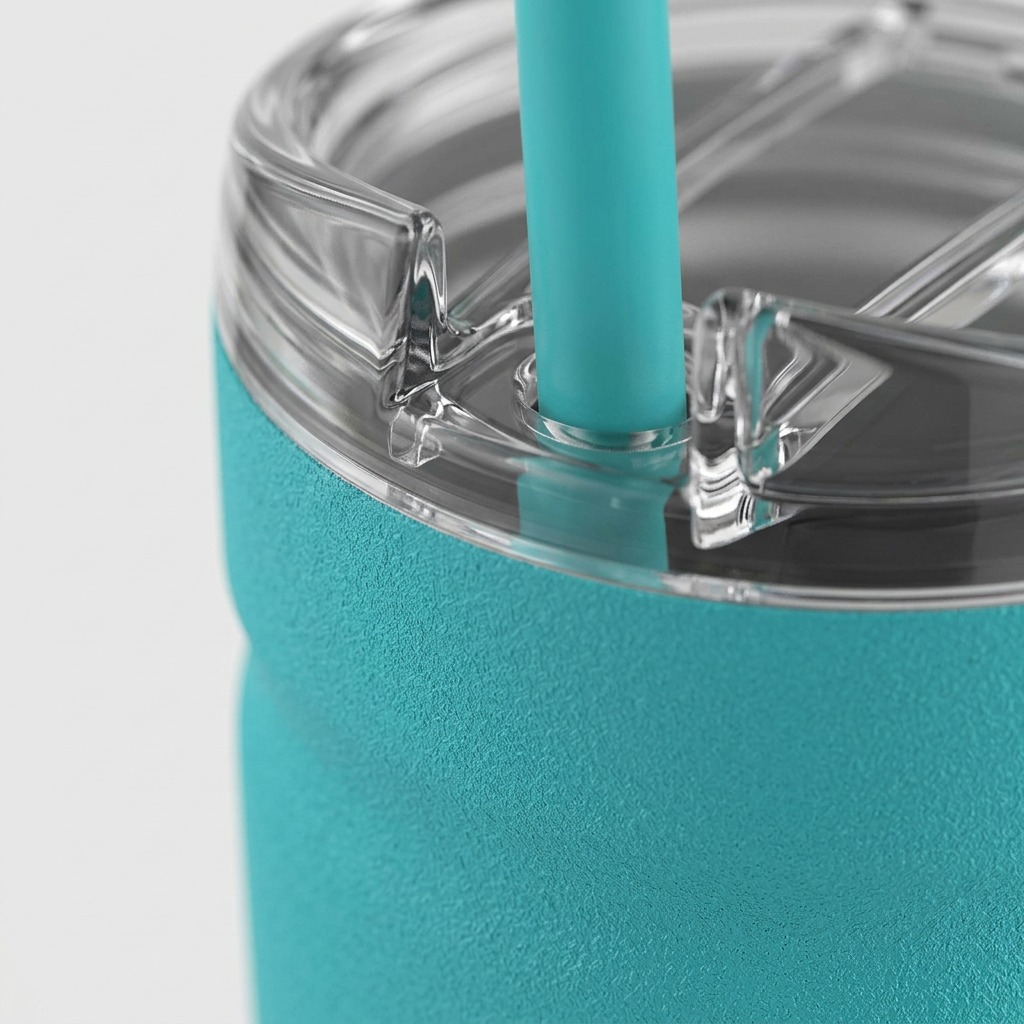 A macro photograph detail of the Bubba Envy S tumbler's matte textured Scuba finish and the clear lid's sealed opening.