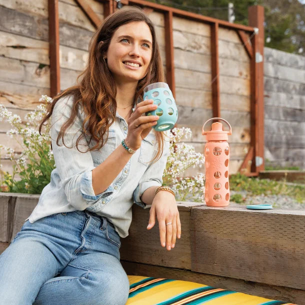 Lifefactory® 22-Oz. Glass Water Bottle with Active Flip Cap and Protective Silicone Sleeve (Cantaloupe)