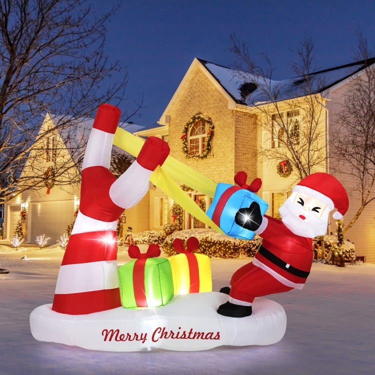7 Feet Christmas Inflatables Santa with Slingshot and Built-in LED Lights Outdoor Decoration
