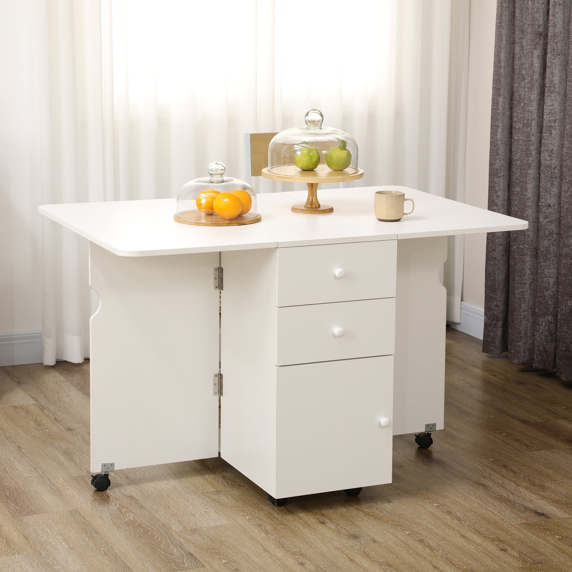 HOMCOM Extendable Drop Leaf Dining Table with 2 Drawers Cabinet 6 Wheels for Small Spaces Kitchen White