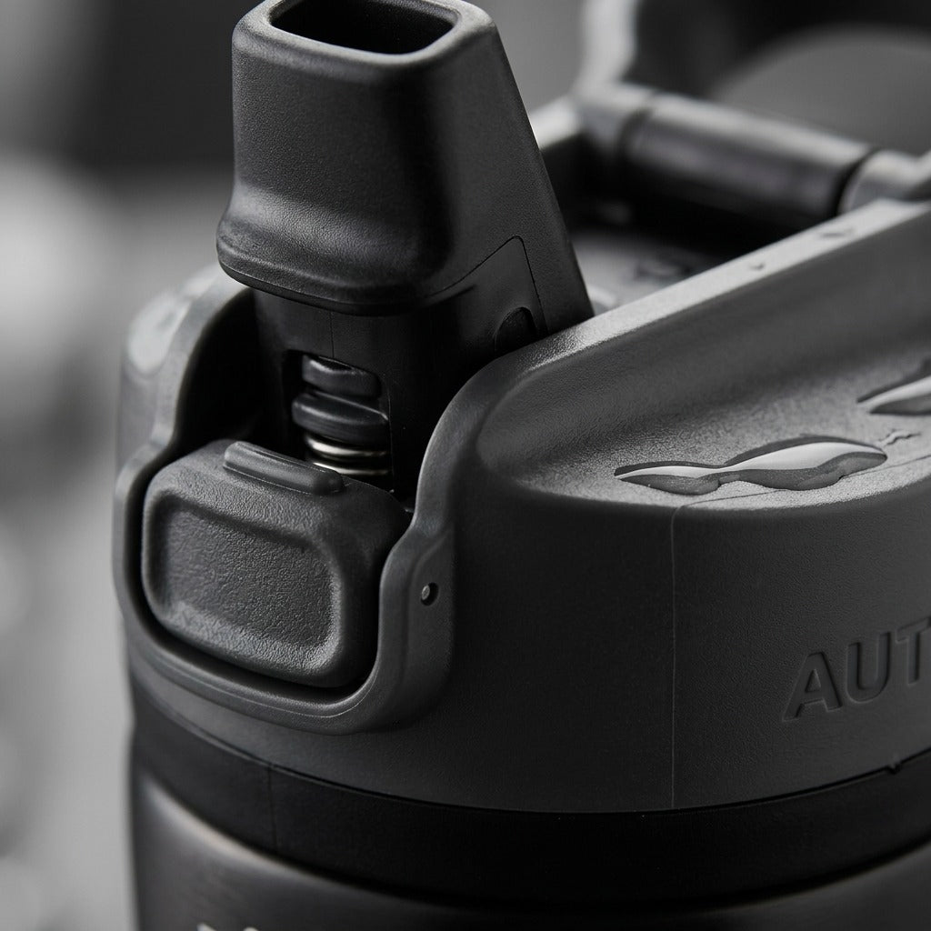 Macro photo detailing the Contigo water bottle's AUTOSEAL mechanism, button, and spout textures.