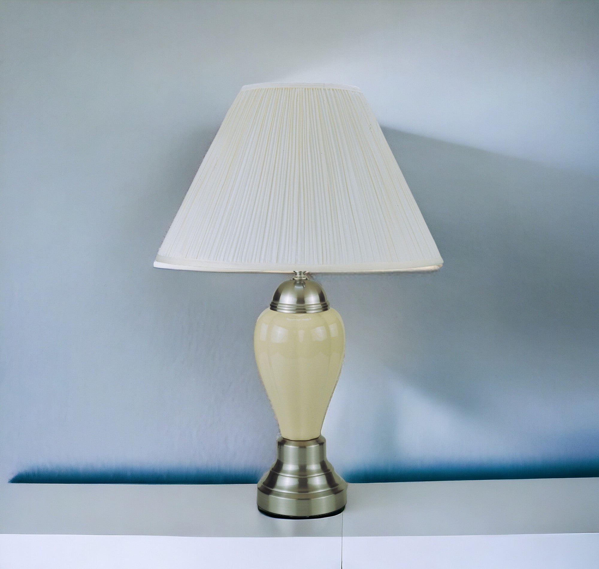 27" Ivory and Silver Ceramic Urn Table Lamp With White Empire Shade