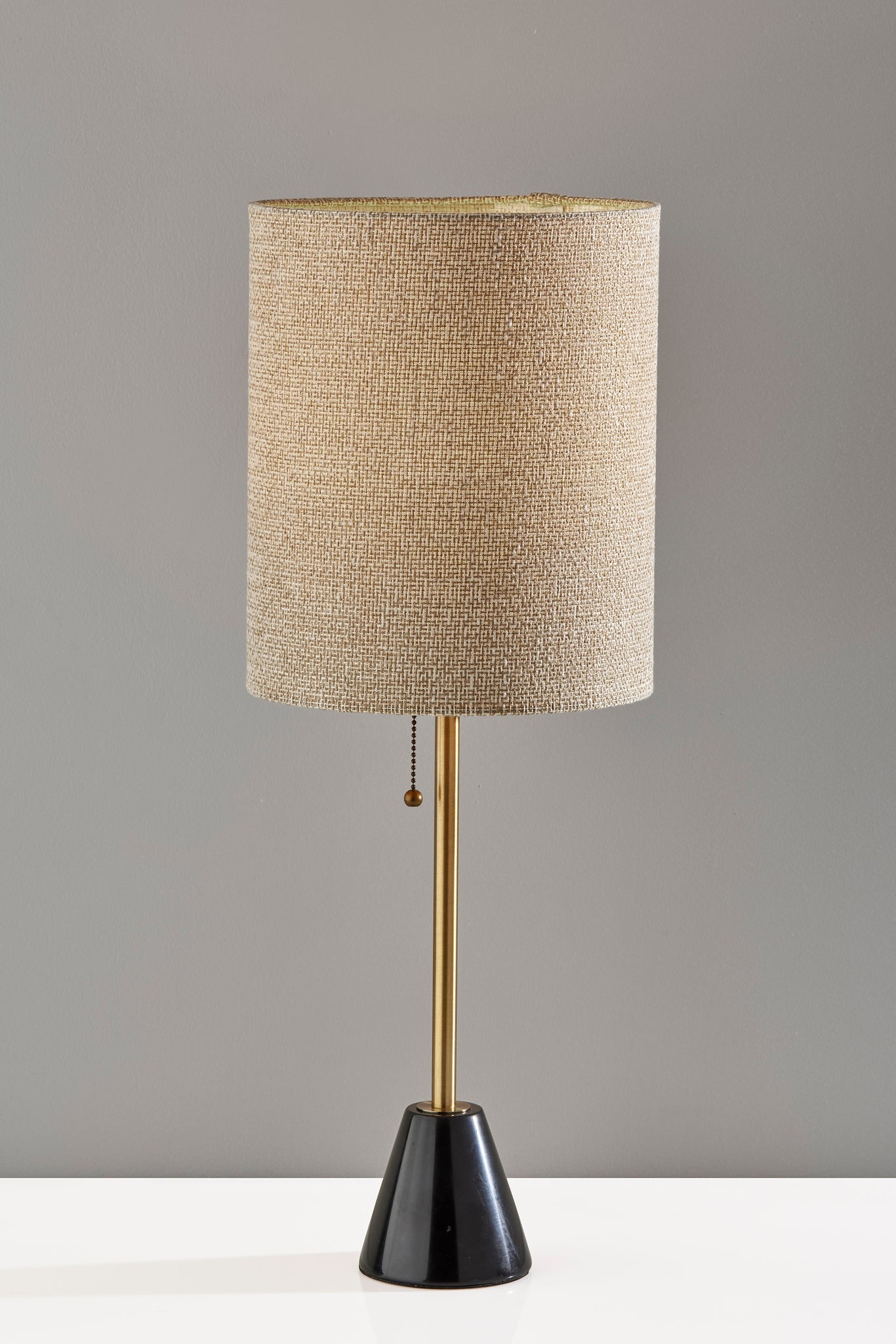 28" Black and Gold Metal Cylinder Table Lamp With Beige Drum Shade