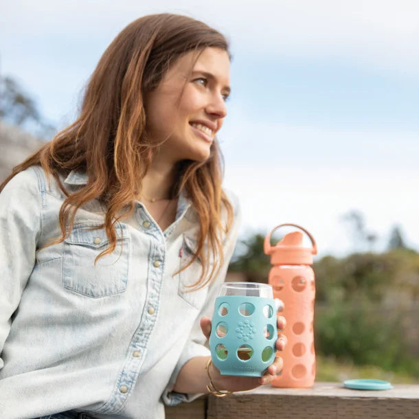 Lifefactory® 22-Oz. Glass Water Bottle with Active Flip Cap and Protective Silicone Sleeve (Cantaloupe)