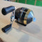 Emery Stinger Spin Cast Reel – Vented Aluminum Cover, Brass-Zinc Gears, 1 Ball Bearing, 3.0:1 Gear Ratio, Prespooled with 10 lb Line