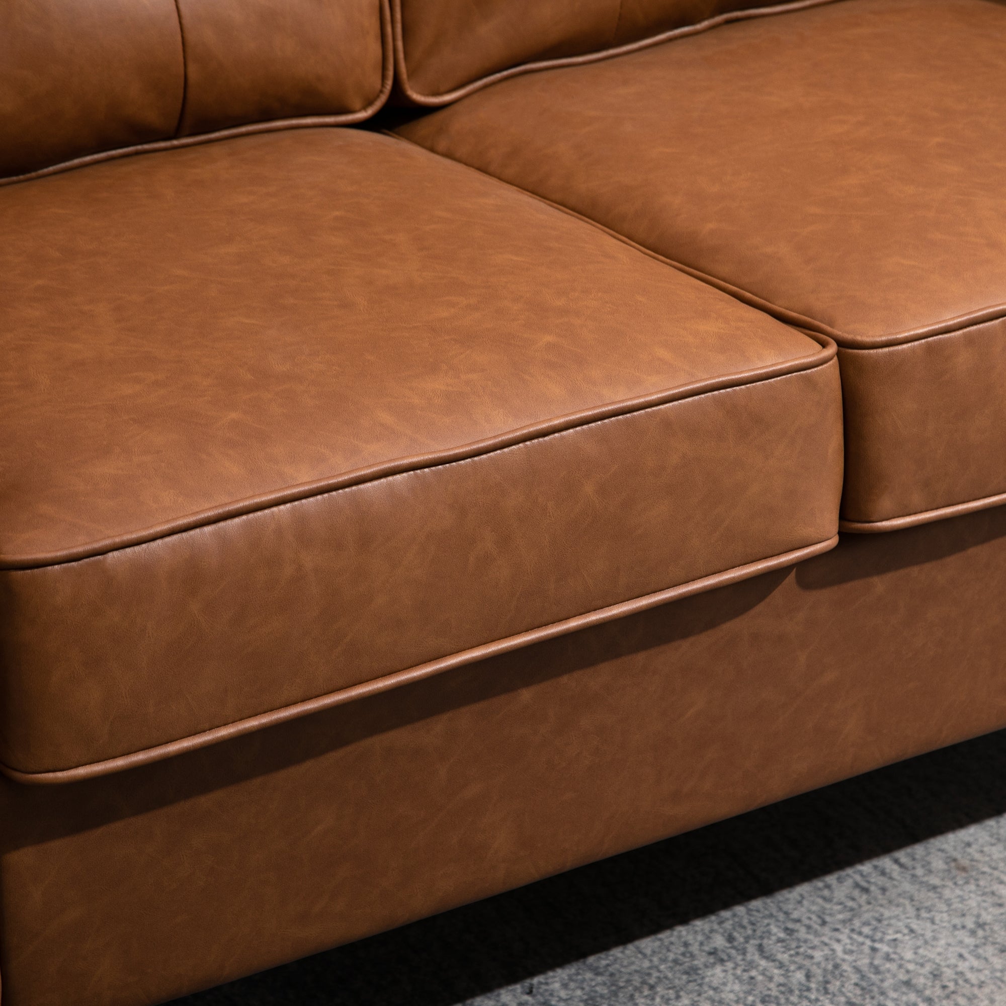 HOMCOM Brown 51" PU Leather Double Sofa with Sponge Padding and Tufted Back Comfortable Seating 