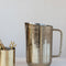 Twig Stainless Steel Pitcher – Sculptural 2-Quart Pitcher with Etched Floral Design & Brass Twig Handle for Elegant Serving
